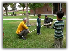 Stick Walk Backwards
